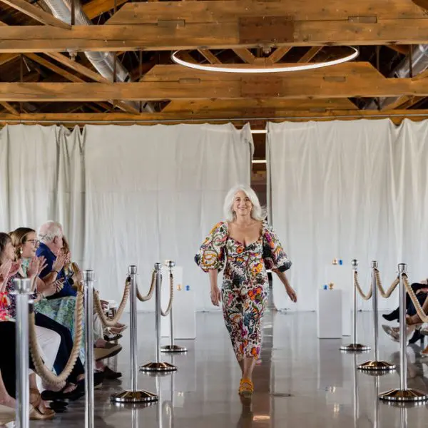 Women walking down aisle during wedding ceremony