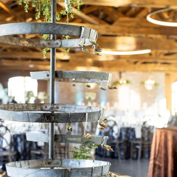 appetizers on spoons on tiered serving display